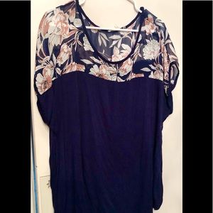 Navy top with floral accents